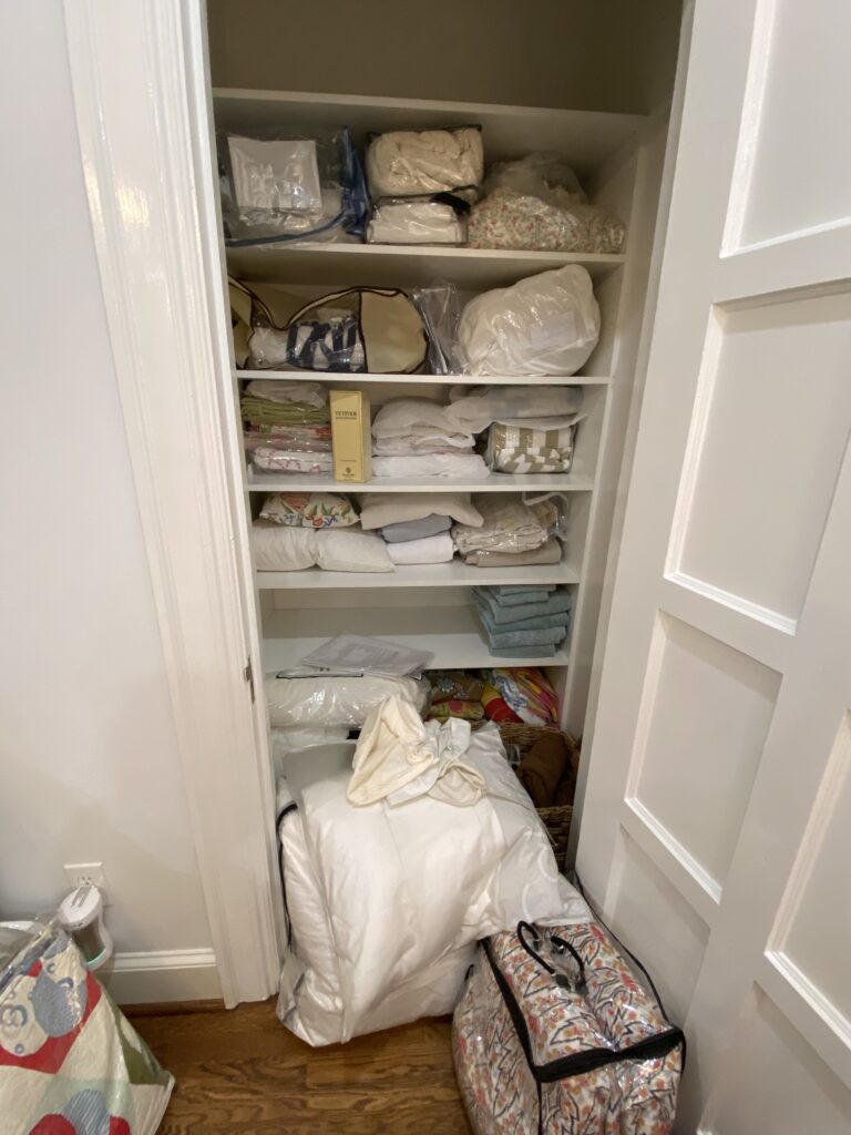 Unorganized linen closet