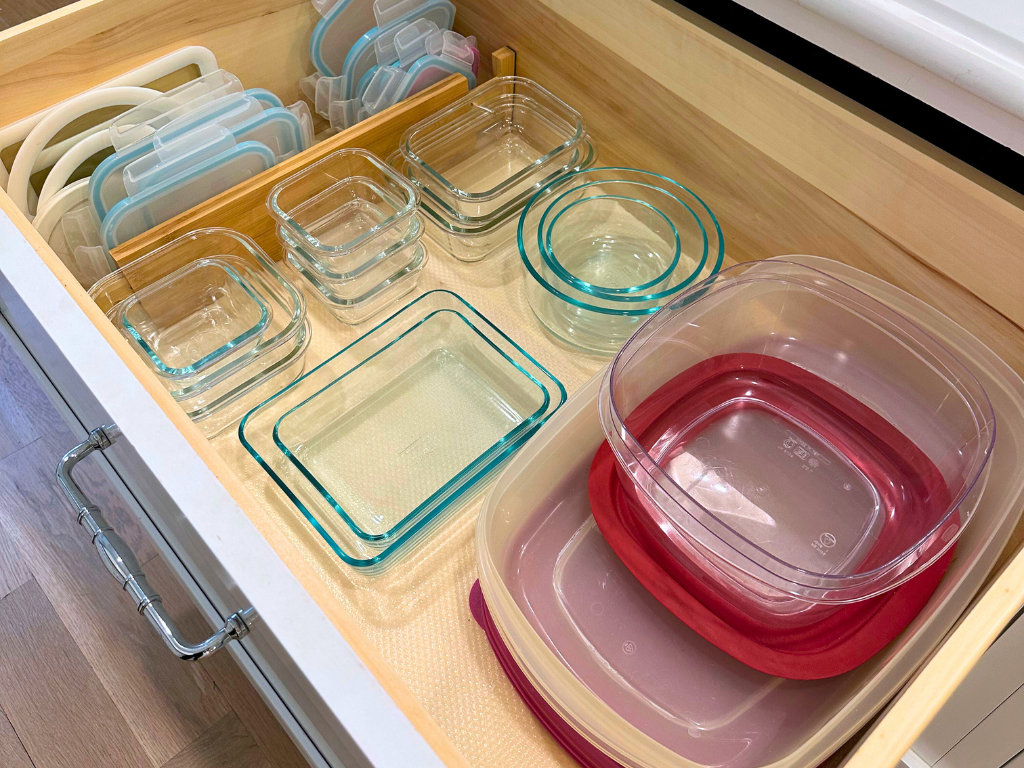 tupperware organized in drawer 