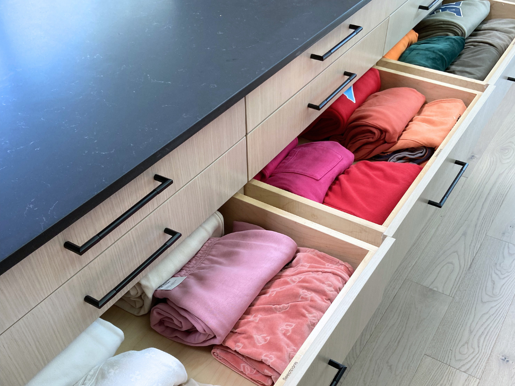 Color coding home organization of file folded clothes in drawers